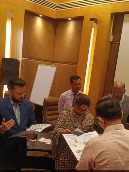 Reviewing materials for the new Dermavidya educational platform with fellow dermatologists. Continuous medical education is a cornerstone of my practice.