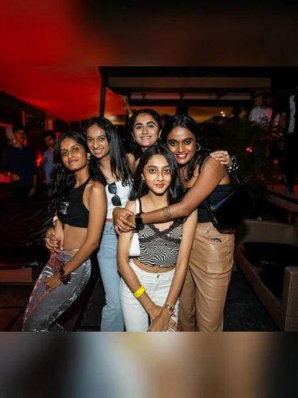 The party isn't just on the dance floor. Guests enjoying the vibe and posing for a picture at Kitty Ko.
