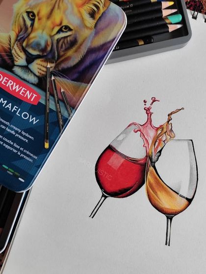 The wine glass drawing shown in my sketchbook next to my Derwent Chromaflow pencils.