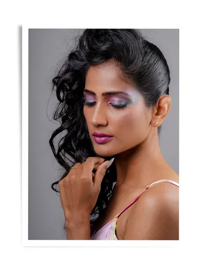 Another angle of Karishma's creative makeup, highlighting the beautiful blend of colors on the eyes.