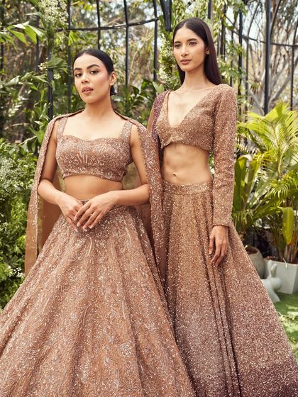 This selection showcases the breadth of my bridal and couture curation. It includes a variety of lehengas, gowns, and sets in different colors and styles, from traditional reds by Anupraas to modern ivories by Mirroir and Varun Chakkilam, ensuring every bride finds her perfect look.