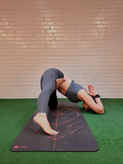 A post-festival reset with a humble bow in this variation of Humble Warrior. This pose is about gratitude, stretching out the body, and finding calm after a period of celebration.