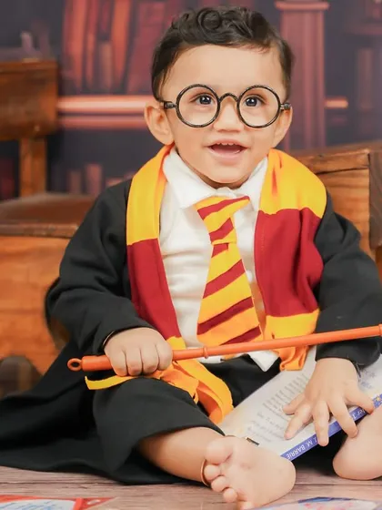 For the little wizards in training, my Harry Potter theme is always a magical choice. I provide the costume, props, and the library backdrop to bring the enchantment to life.