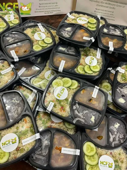 Our combo meals, sealed and labeled with the NCF logo, ready for delivery.