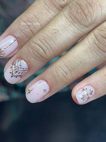 More intricate gold chrome patterns, inspired by traditional motifs.