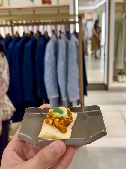 A hand-held appetizer of paneer tikka on a flaky pastry, served at the chic Tasva store launch.