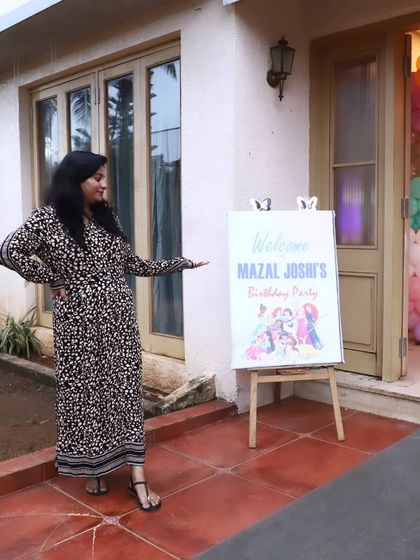 Posing at the entrance of a villa party we decorated, ready to welcome the guests.