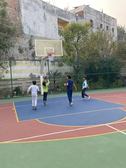 Players move around the court during a scrimmage.