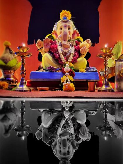 A creative edit of the reflection shot, where the reflection is in black and white. This color pop technique draws all the attention to the vibrant, colorful idol of Lord Ganesha.