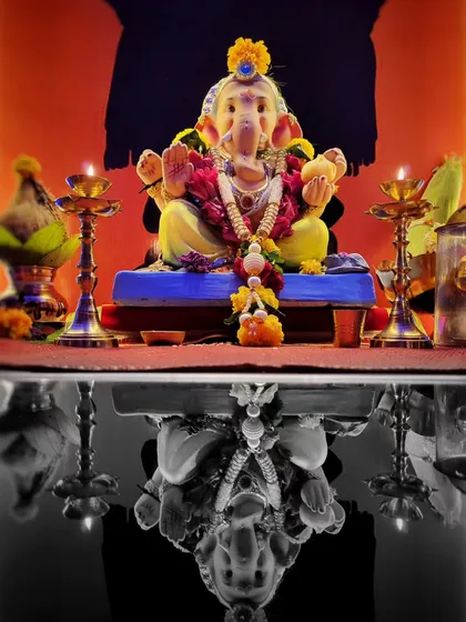 A creative edit of the reflection shot, where the reflection is in black and white. This color pop technique draws all the attention to the vibrant, colorful idol of Lord Ganesha.
