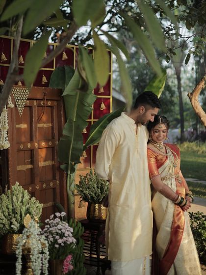 A romantic portrait of the couple in a beautiful, traditional setting. The bride's makeup is soft and timeless, perfect for these cherished memories.