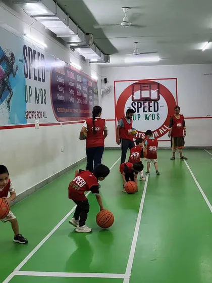 Our little champs learning the basics of basketball. Dribbling is a fundamental skill, and we make sure everyone gets plenty of practice.