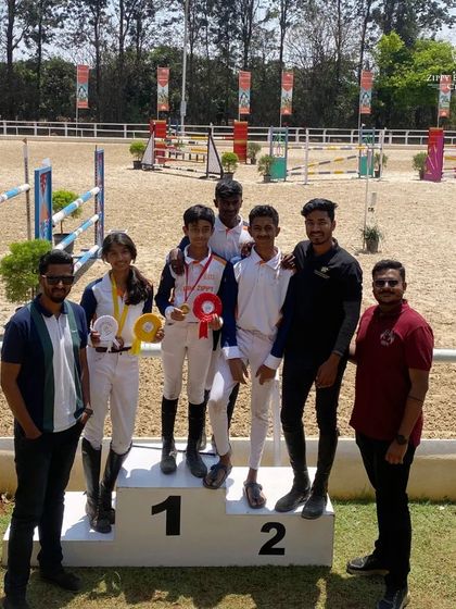 Our riders and trainers celebrating multiple wins. These moments on the podium are what we train for.