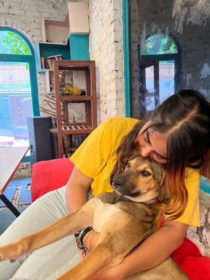 A sweet cuddle for Bugs. He's a testament to how loving and gentle rescue dogs can be.