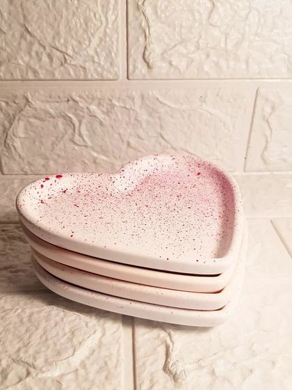 A stack of our mini heart dishes, ready to be packed for our Mother's Day collection.