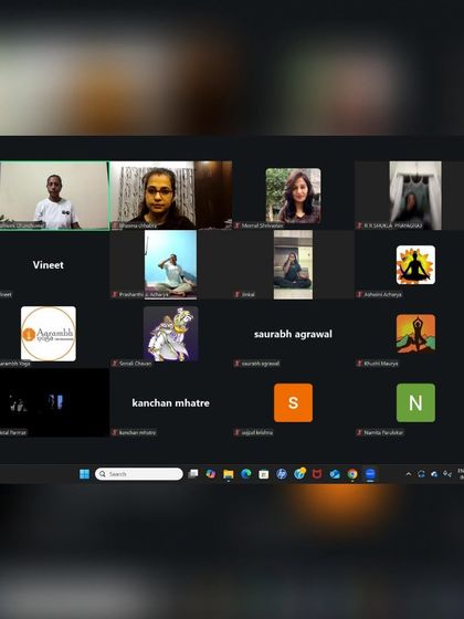 Our online platform brings people together from different places for shared learning and practice. This screenshot shows a diverse group of students actively participating in a live Zoom session, creating a collective energy of mindfulness and self-care.