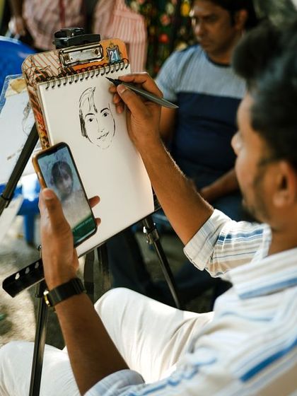 Get a personalized caricature drawn by a professional artist. It's a fun and unique souvenir to remember your day at our festival, capturing your likeness with a humorous twist.