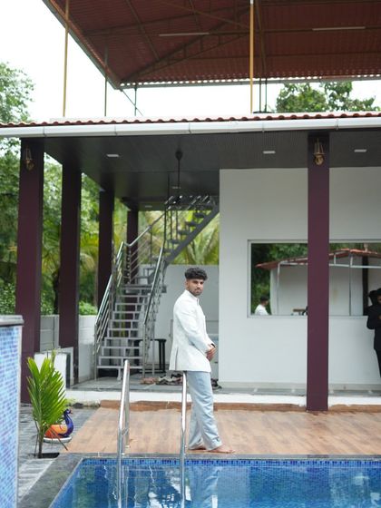 The grey Jodhpuri suit looks great from every angle. It's a comfortable and stylish option for any man looking to rent an outfit for a special occasion.