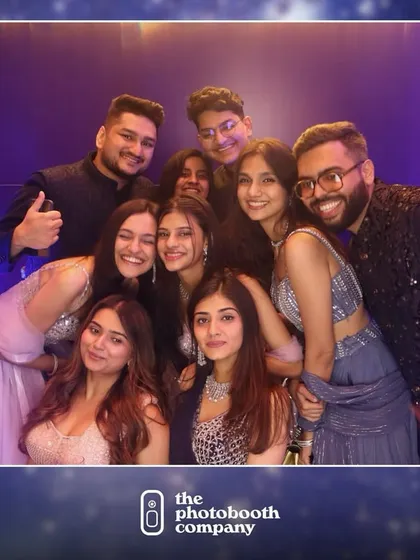 A large group of friends packed into the frame for a fun photo. We encourage the happy chaos, capturing the energy and camaraderie of your friend group.