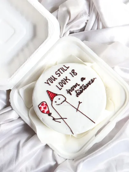 I love making these fun and quirky bento cakes! This one has a funny meme design that's perfect for a friend with a great sense of humor. It's a small cake that brings a big smile.