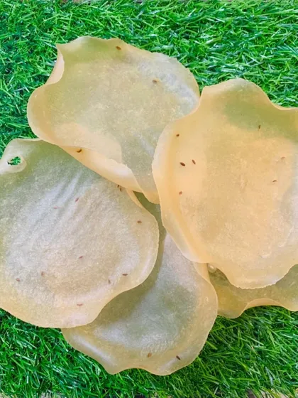 These are my homemade Rice Papads, also known as Khichiya. They are light, crispy, and ready to fry for a perfect meal accompaniment or a standalone snack. The jeera seeds add a lovely aromatic flavor.