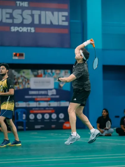We capture the peak action moments that define a great sporting event. This employee from Gameskraft is caught mid air during a powerful jump smash, showcasing the high energy and competitive fun of our badminton tournaments.