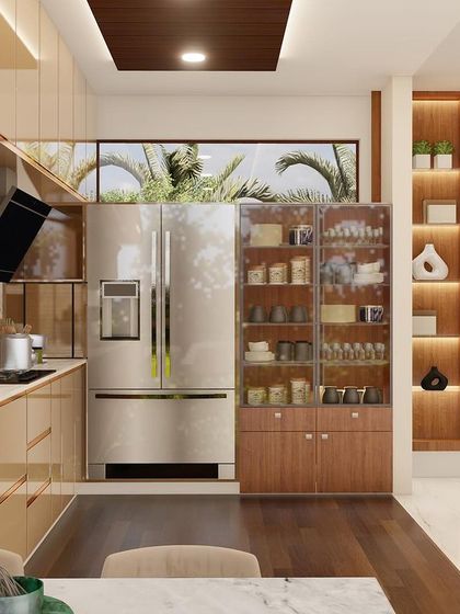 This open-kitchen concept features glossy, beige cabinets and a marble backsplash. The design includes a tall crockery unit and is seamlessly integrated with the living area.
