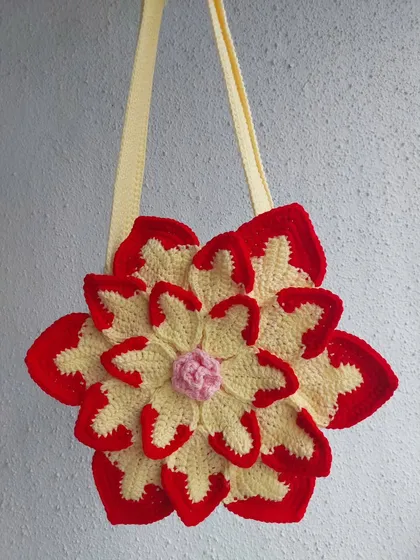 This photo of the bag hanging shows its shape and structure clearly.