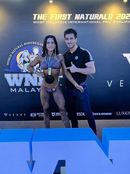 With my husband and biggest support system, Aditya, at the WNBF Malaysia show. Having a strong support system is crucial during the intense phases of competition prep.