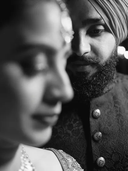 A powerful black and white close-up that focuses on the deep connection between the couple. This artistic style allows the raw emotion of the moment to stand out, creating a timeless and impactful image.