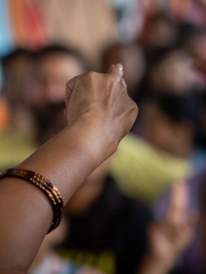 The power of sign language is the power of connection. This close-up shot captures the expressive nature of hands in communication, a central theme of our inclusion efforts.