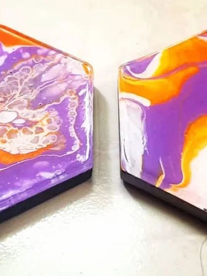 A different angle of the custom-ordered coasters, showing their glossy finish. If you have a specific color scheme for your home, we can create a custom set of coasters to match it perfectly.