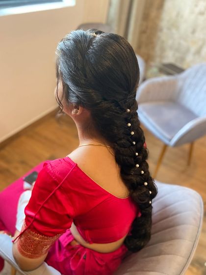 A seated view of the braid, showing how it elegantly drapes down the back.