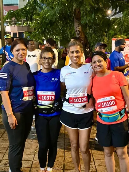 The ladies of our running crew, ready to take on the Mumbai Half Marathon at the start line.