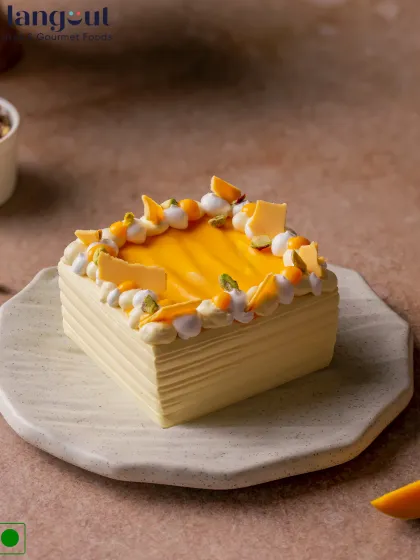 This is my Mango No Added Sugar Bento Cake. It's not only gluten-free but is sweetened naturally with real Alphonso mangoes, so you get a truly clean, fruity flavour in every bite. It's a perfect guilt-free treat for one or two people.