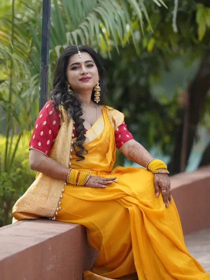 A classic portrait of the bride on her Haldi day, looking serene and happy.