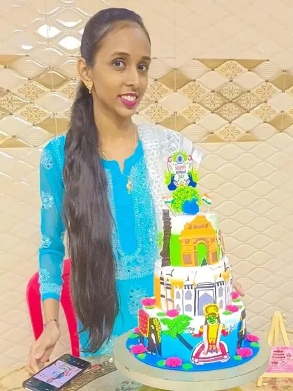 This is the cake that, Mashallah, won first prize in a baking competition. It shows how you can learn to tell a story with fondant and color, creating detailed, multi-tiered cakes right from your own kitchen.