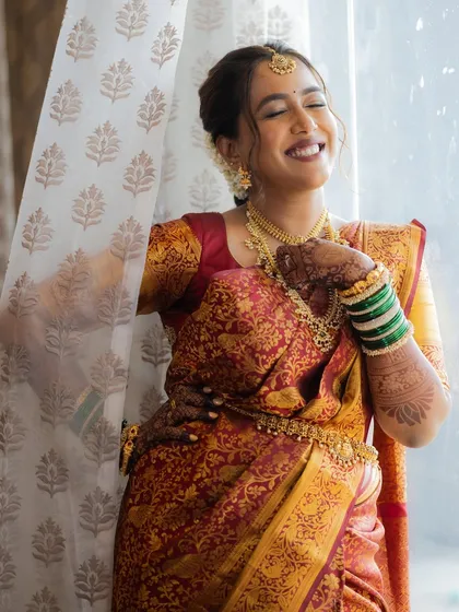 A moment of pure, uninhibited laughter from the bride, showcasing her natural beauty.