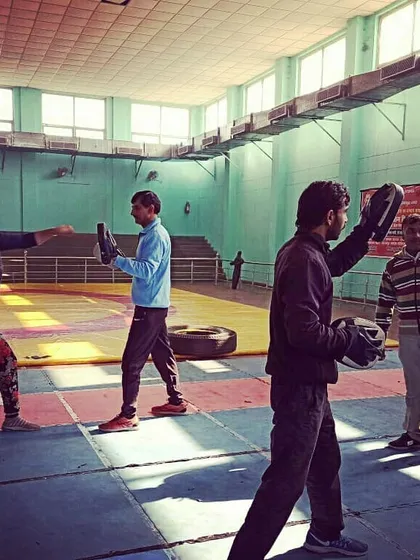 A snapshot from one of my corporate self-defence workshops, where employees learn basic striking techniques in a group setting.