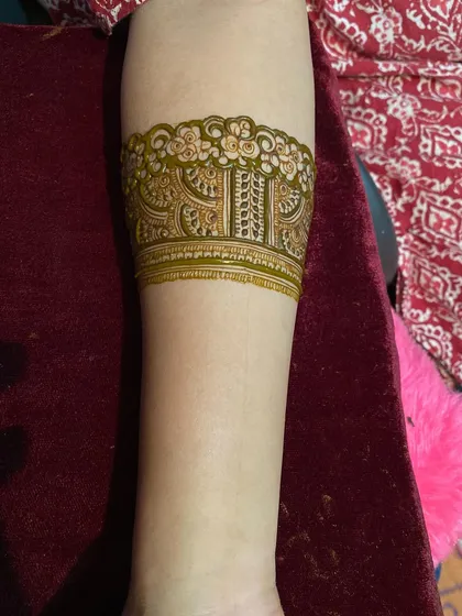 The design band is now filled in with more details, showing the progression of a practice piece.