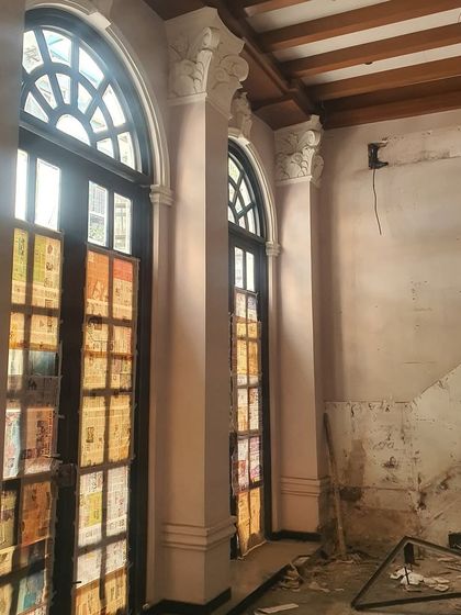 Another view of the Eka site during the initial stages. We worked to preserve the beautiful heritage elements, like these arched windows and decorative column capitals, while transforming the space.