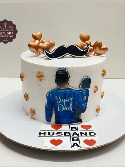 A cake for a super dad and husband. This design features a "Super Dad" image and a fun Scrabble-style message, making it a heartfelt gift for a family man.