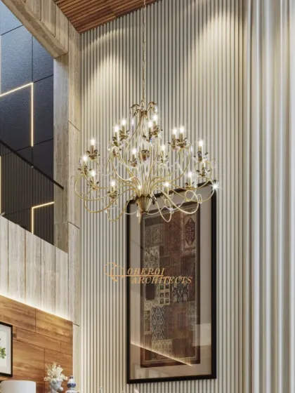 The double-height ceiling in this dining area is accentuated by a grand, traditional chandelier, making a powerful statement of timeless elegance.