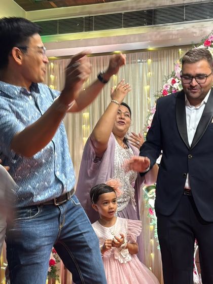 Even the non-dancers hit the floor at my parties. This candid shot from a Bandola bash shows the pure joy and fun that I love to create.