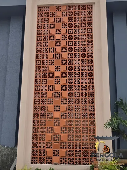 A large-scale jali wall feature we built as part of a building's facade. The intricate pattern, with its protruding elements, creates a stunning textural surface that is both a traditional and modern architectural statement.