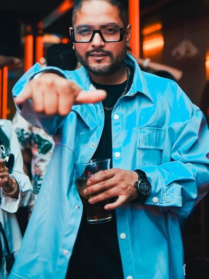 Sometimes you just have to embrace your nerdy side. A fun shot of me enjoying a drink and the party.