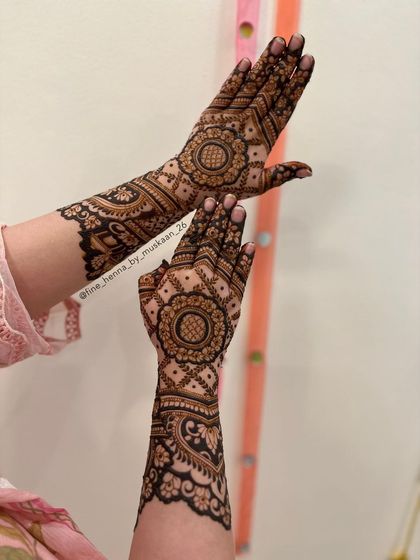 Another view of the full-arm mandala design, showing the detail and symmetry.