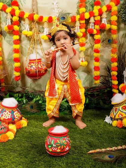 A promotional photo for the Janmashtami sessions, featuring a little boy as Krishna with his flute.