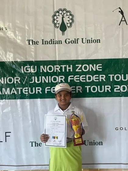 A proud Dhriti Singh with her trophy and certificate after winning the IGU North Zone championship.