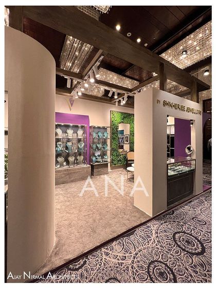 Another view of the curved entry walls at the Villandi '22 booth. The design guides visitors naturally into the main display area while maintaining an elegant and sculptural form.